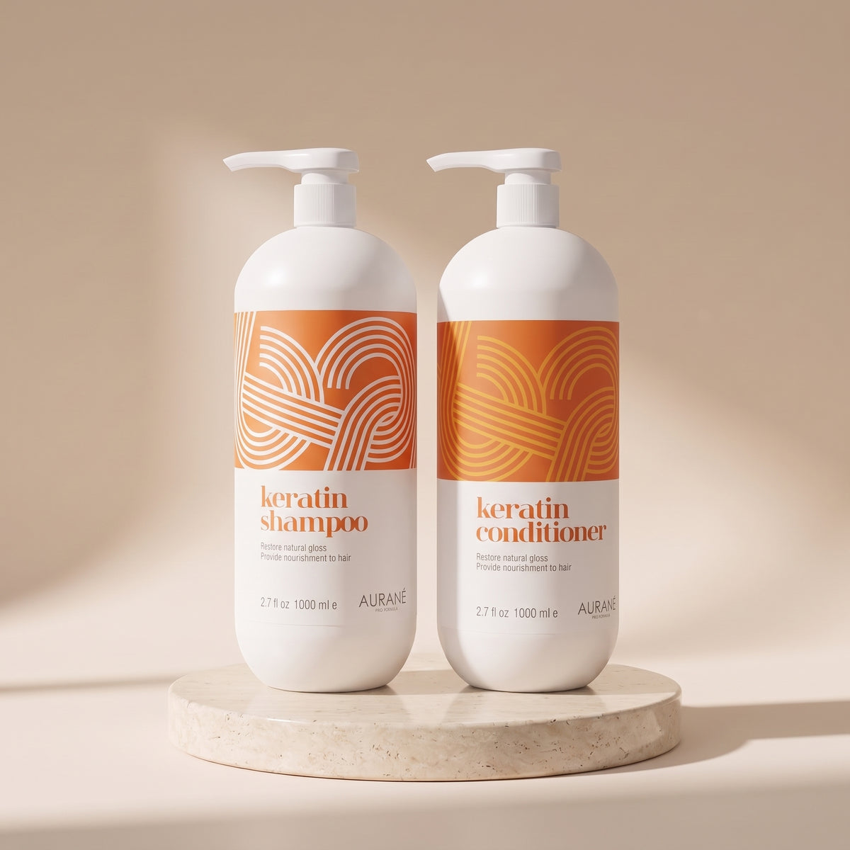 Aurané Keratin Shampoo and Conditioner set, 1000ml each, on a travertine stand