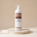 Aurané Protein Moisturizing Shampoo 750ml on a travertine stand