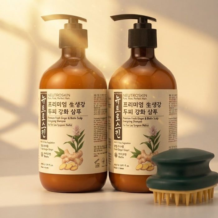 shampoo and conditioner bottles with a scalp brush